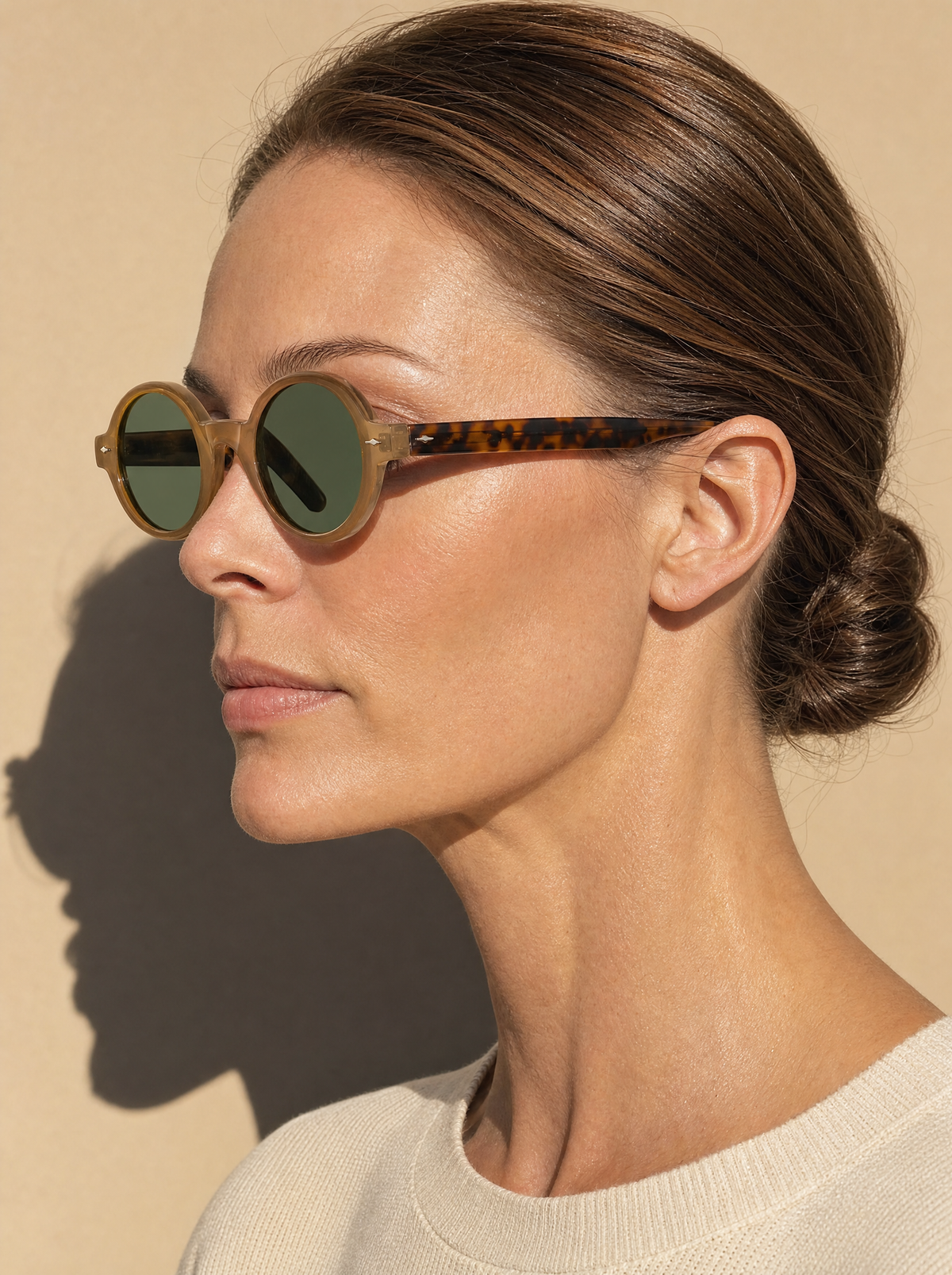 PENNY Frame 07 in SCOTCH, profile showing the tortoiseshell temple against the translucent front