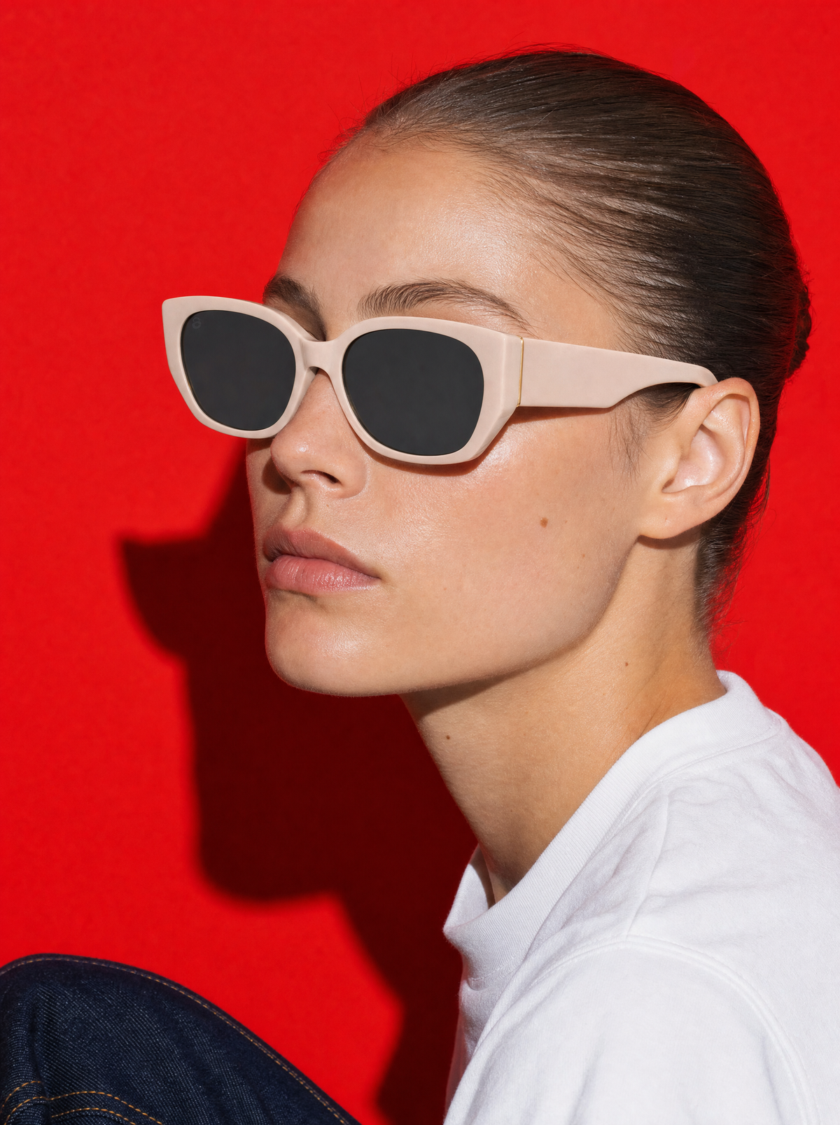 SLANT Frame 08 cat-eye sunglasses in BONE warm pink-nude, three-quarter portrait
