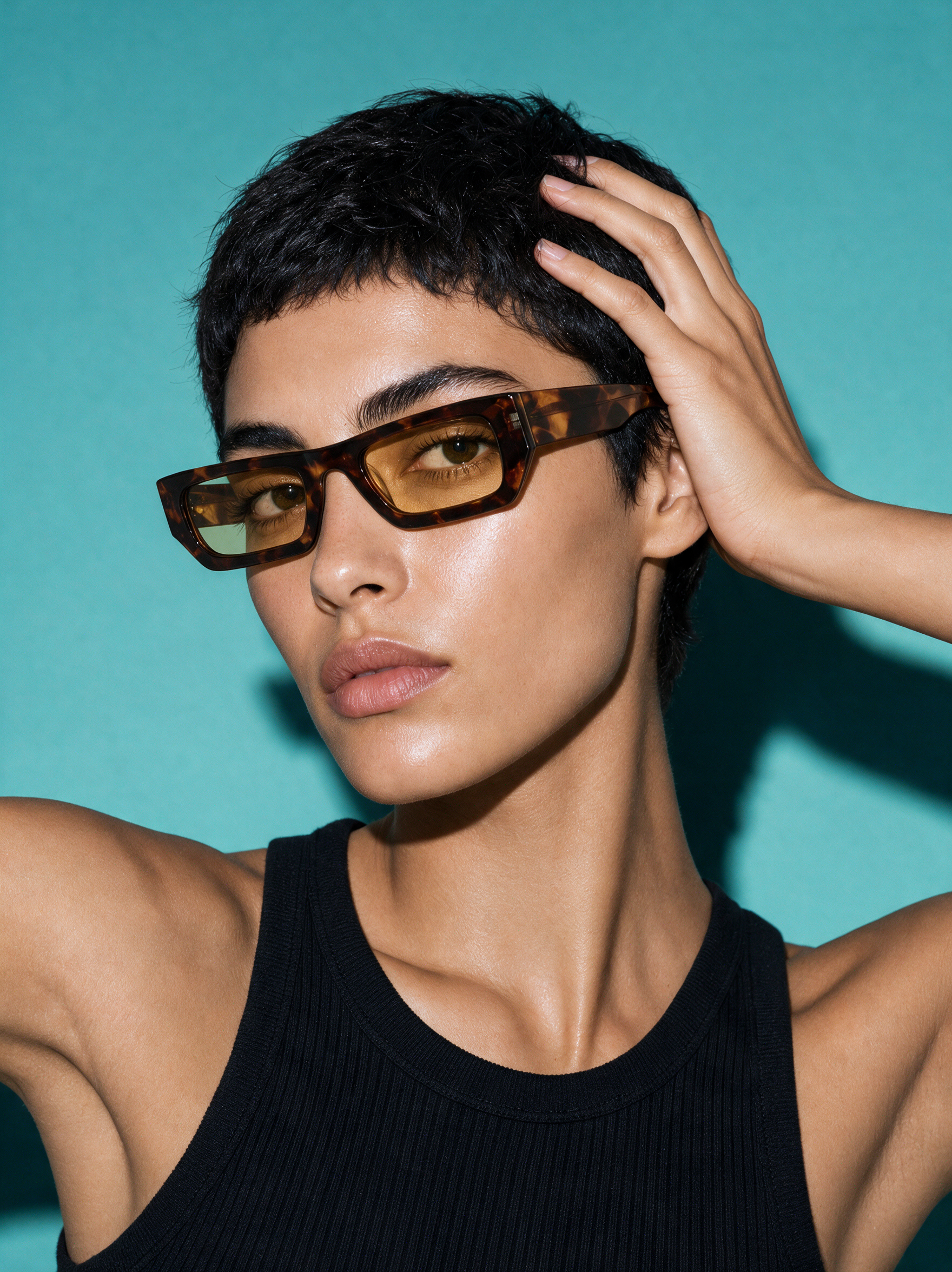 BLADE Frame 17 rectangle sunglasses in BRINDLE tortoiseshell, three-quarter portrait