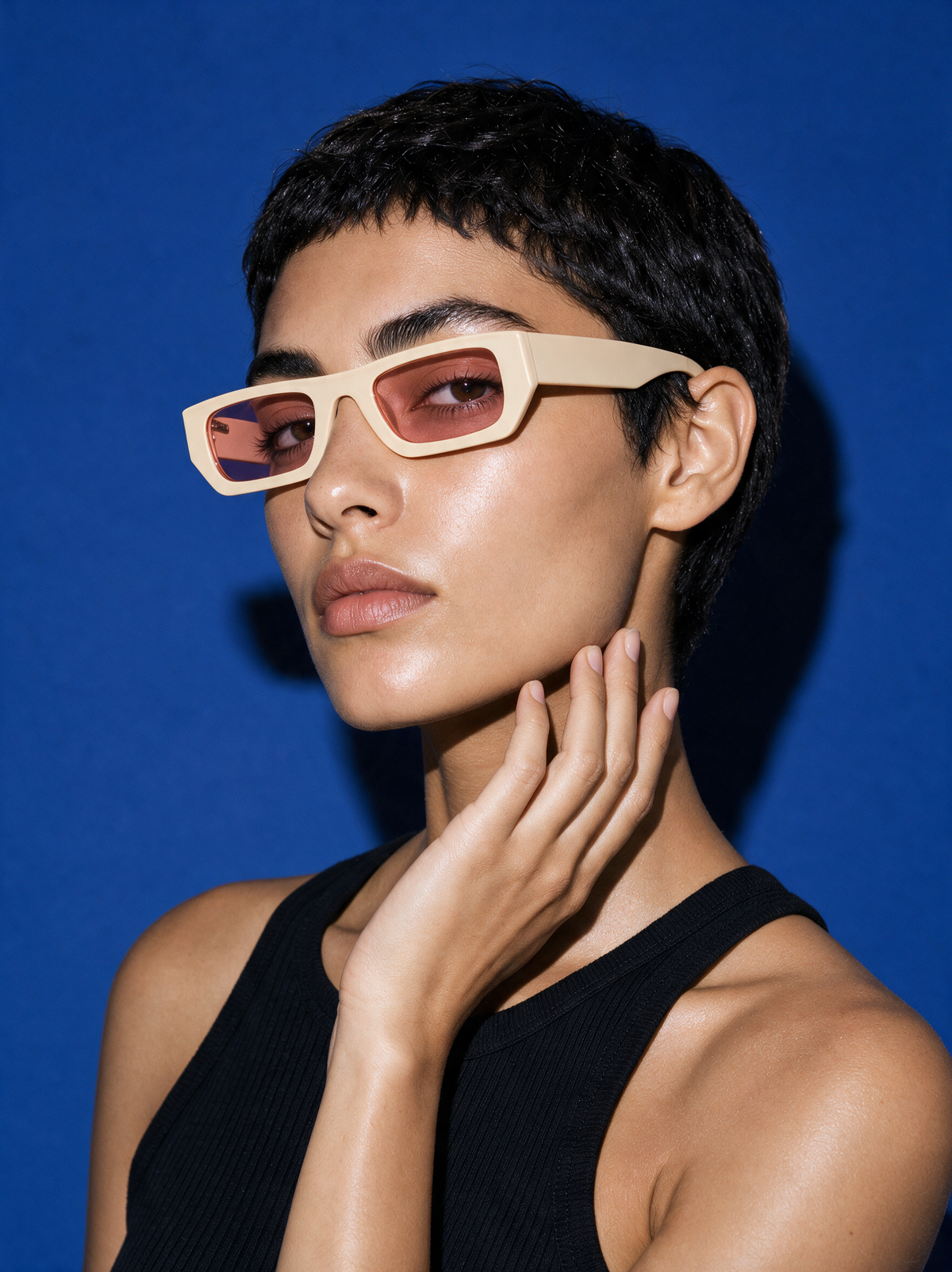 BLADE Frame 17 rectangle sunglasses in MERINGUE powder cream, three-quarter portrait