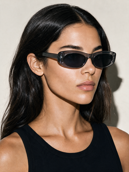 SLINK Frame 20 oval sunglasses in ASH translucent grey, three-quarter portrait