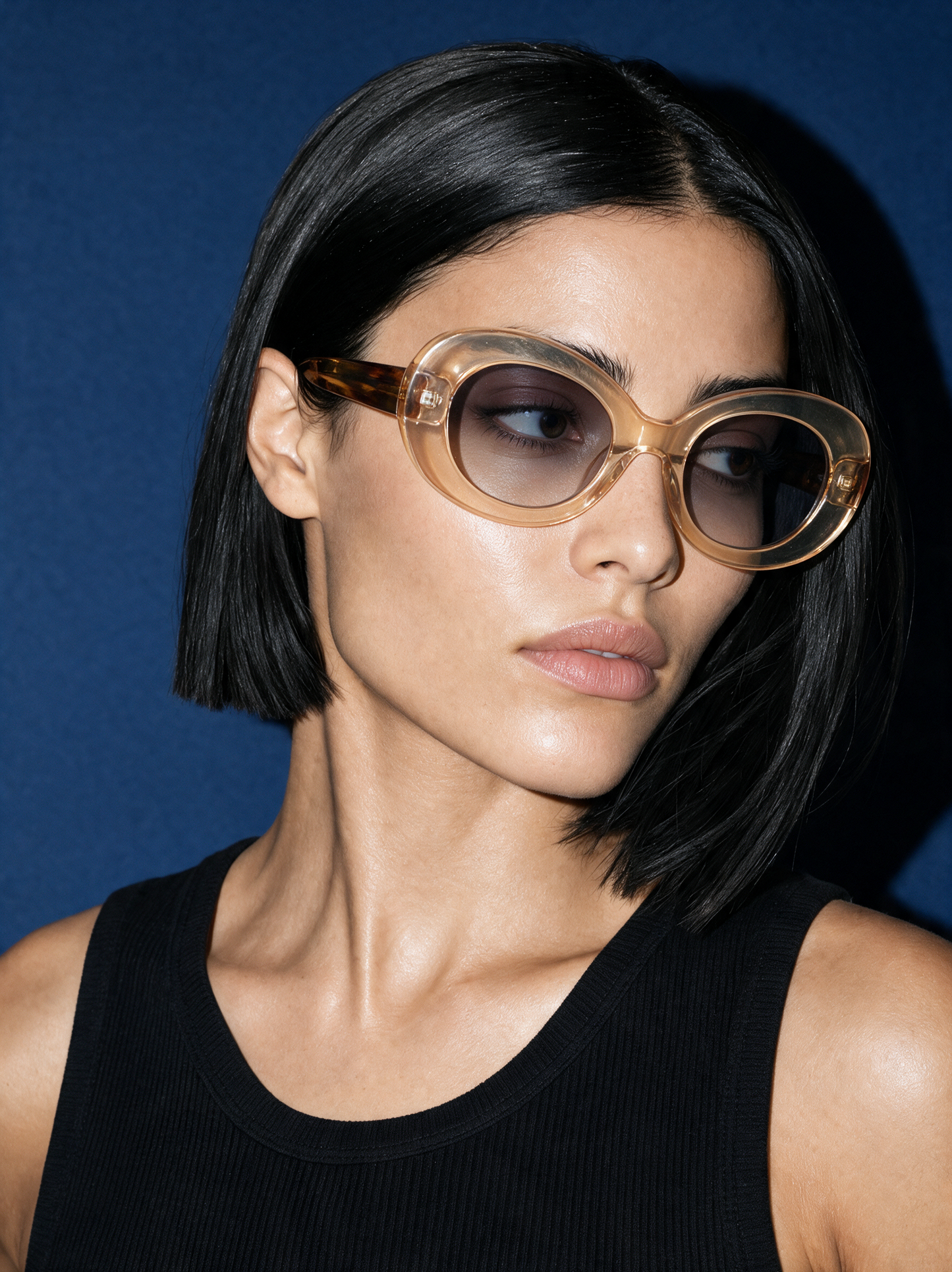 ORBIT Frame 21 oval sunglasses in TOPAZ translucent champagne, three-quarter portrait