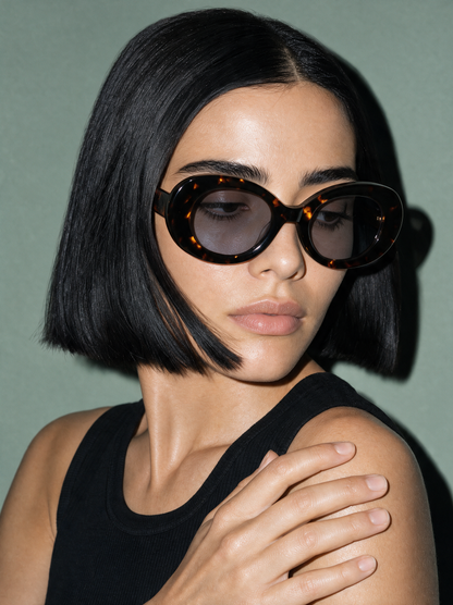 ORBIT Frame 21 oval sunglasses in TREACLE dark tortoiseshell, three-quarter portrait
