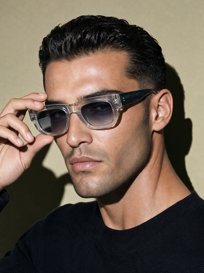 CHISEL Frame 22 sunglasses in GLACIER, clear crystal box frame with marbled blue temples, three-quarter view