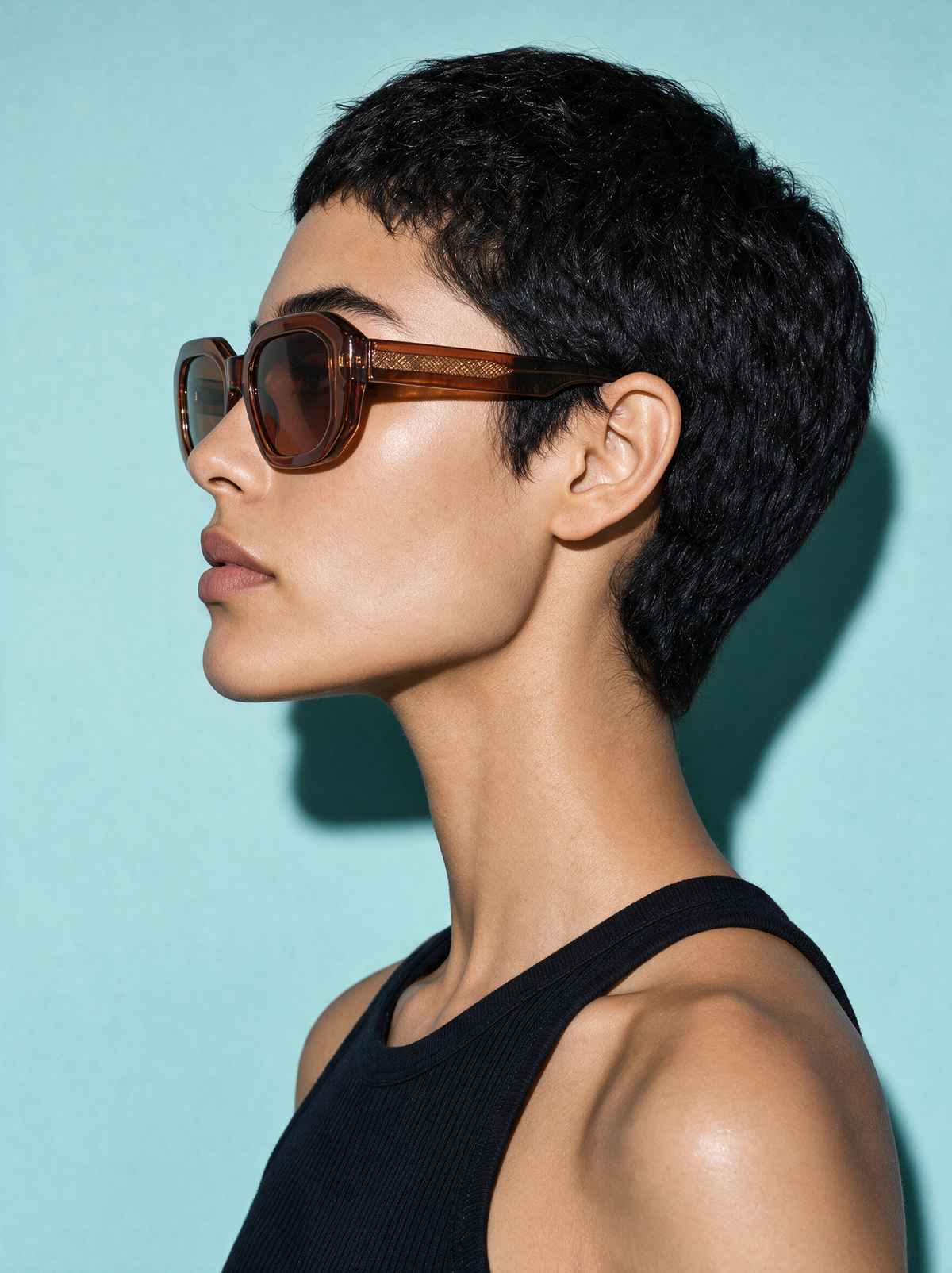 BEVEL BOURBON - transparent light brown faceted octagon sunglasses, side profile showing slab temple
