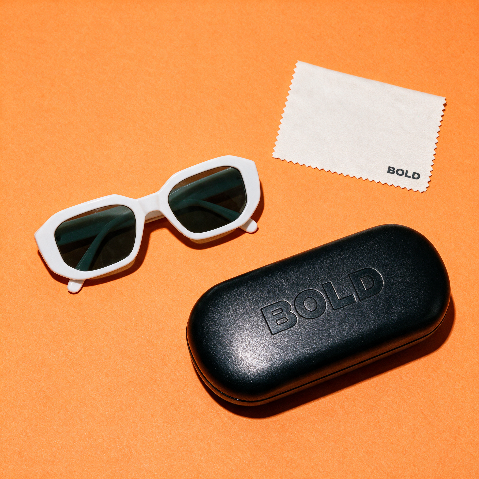 BEVEL PORCELAIN - flat lay with BOLD hard case and cleaning cloth