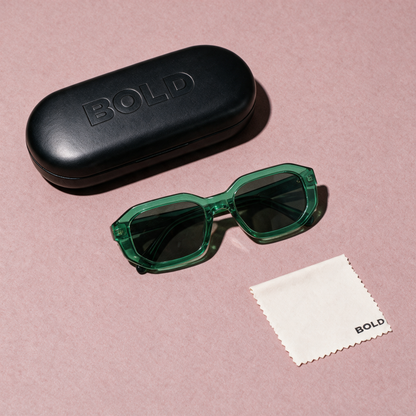 BEVEL EMERALD - flat lay with BOLD hard case and cleaning cloth
